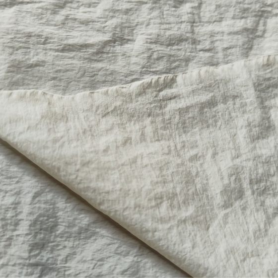 in stock supply 20D/480T Xiao Guang nylon wrinkle sunscreen cotton-padded jacket down jacket casual wear fabric.