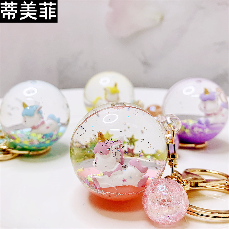 Creative liquid oil key chain quicksand key chain crystal ball unicorn floating car cute bag small pendant