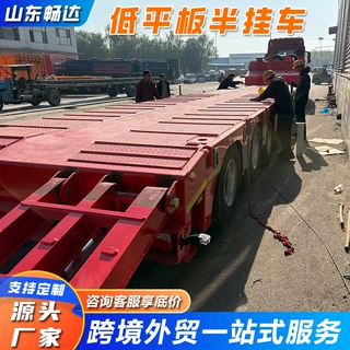 工程机械专用低平板半挂车三线六轴大件运输液压爬梯卡车