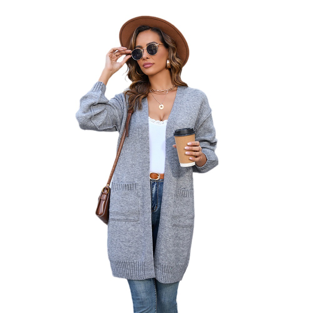 2023 Otoño e Invierno Nueva ropa de mujer de Comercio Exterior de Europa y América Amazon de punto de color sólido de bolsillo de media longitud suéter de moda abrigo
