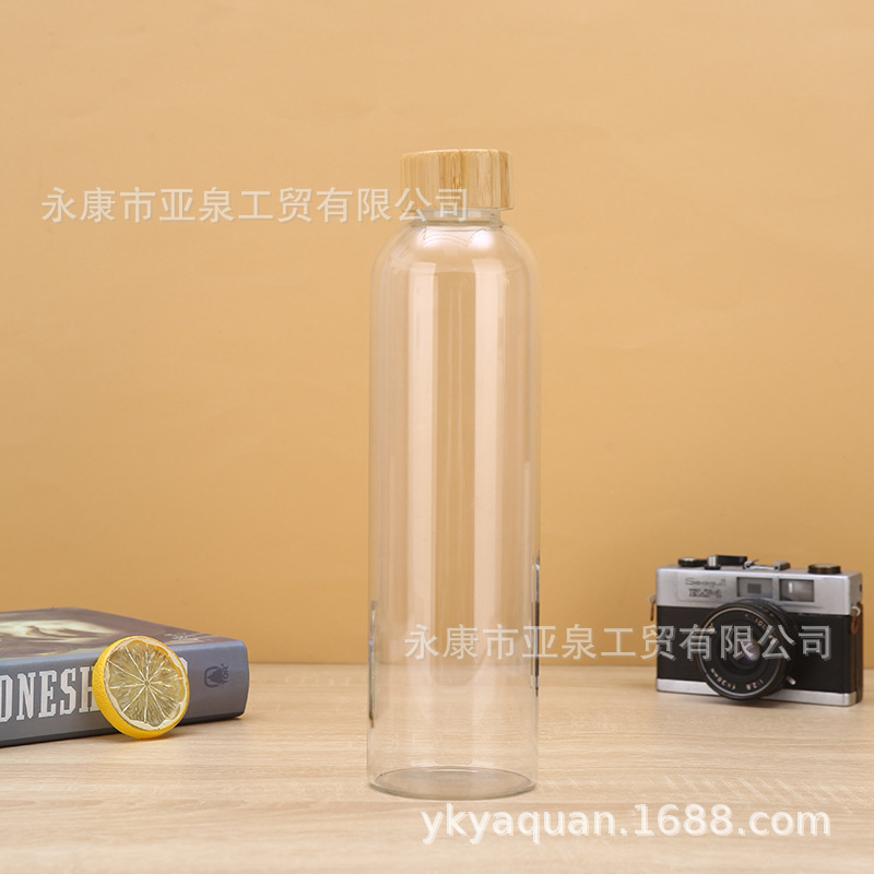 Fabricantes de suministro de copas de bambú portátiles de vidrio transparente aislamiento térmico taza de agua de oficina acompañante taza de regalo se puede imprimir logotipo