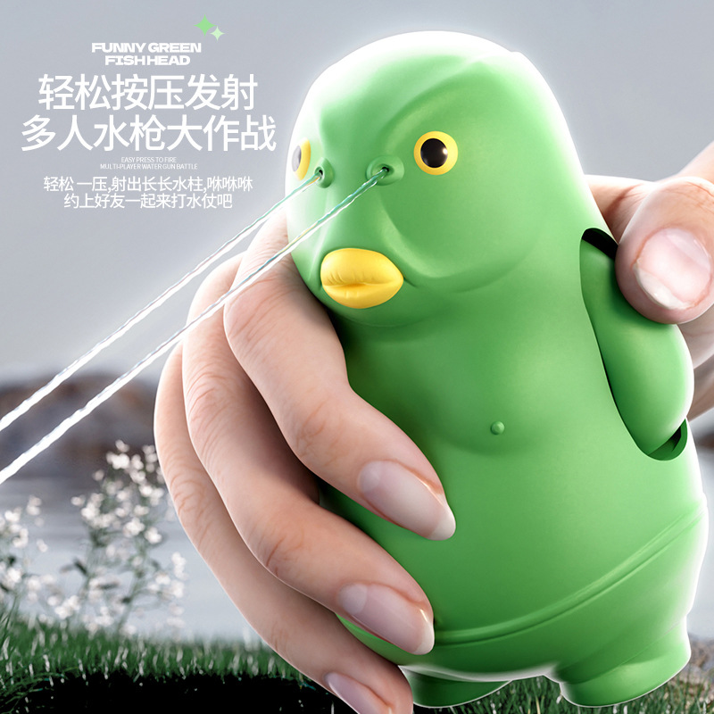 Shake lo mismo cabeza de pez verde presión pistola de chorro de agua al aire libre de agua de playa niños jugando juguetes de agua al por mayor