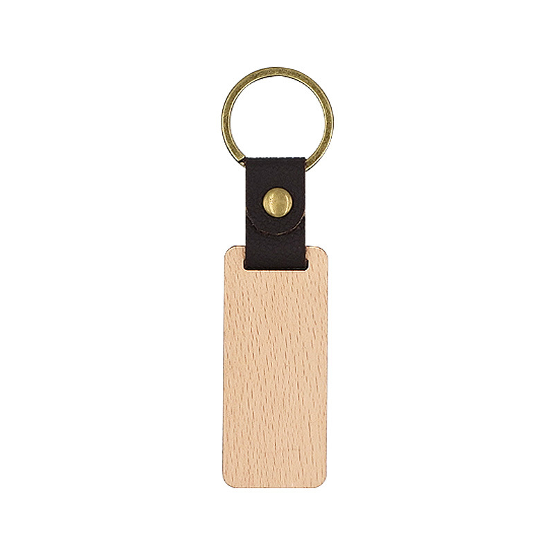 Llavero de madera de nogal negro de cuero spot logo tallado tronco de bambú pu cabeza de llavero colgante