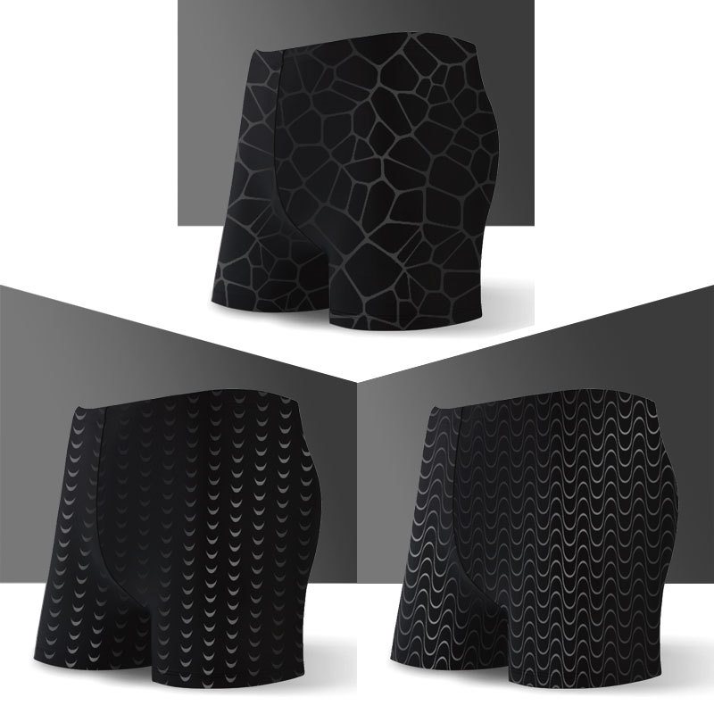 Nuevos hombres anti-vergüenza de impresión oscura de cinco puntos traje de baño de primavera caliente más tamaño impermeable de secado rápido de imitación de piel de tiburón bañador hombres