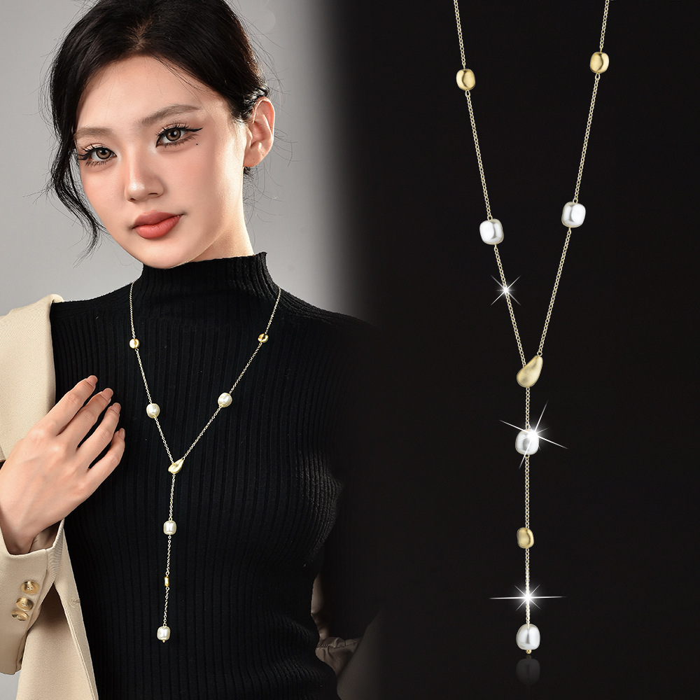 Factory direct autumn and winter new brushed pearl stitching long necklace women fashion Joker temperament sweater chain wholesale