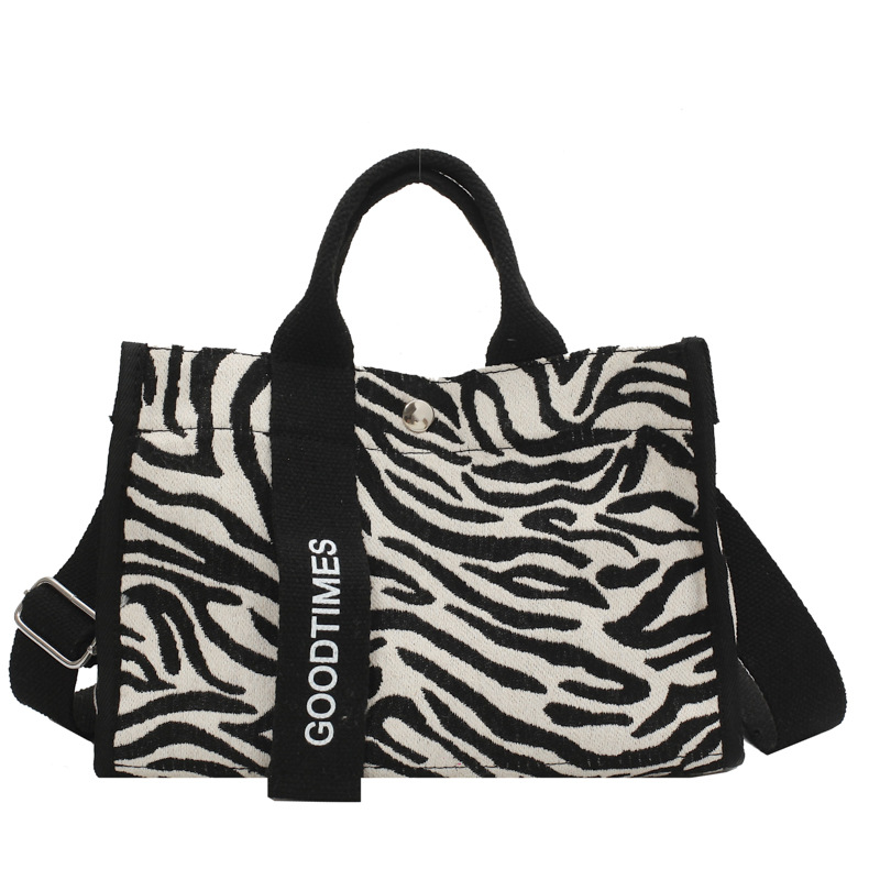 Bolso de lona estilo 2026, primavera y verano, nuevo estilo, bolso de hombro de color contrastante, estilo retro europeo y americano, con correa ancha, bolso cruzado texturizado para mujer