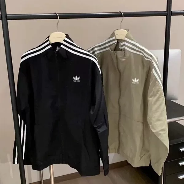 The same style 2025 trendy brand spring and autumn thin jacket for men and women, stand-up collar, breathable, classic windbreaker, versatile jacket