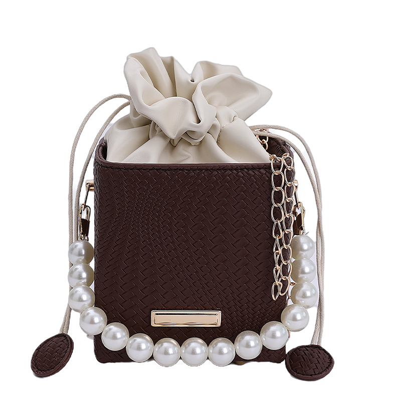 Niche Zhong moda bolso de cubo de mano mujer 2025 nuevo estilo coreano simple versátil bolso de hombro con patrón de ramas