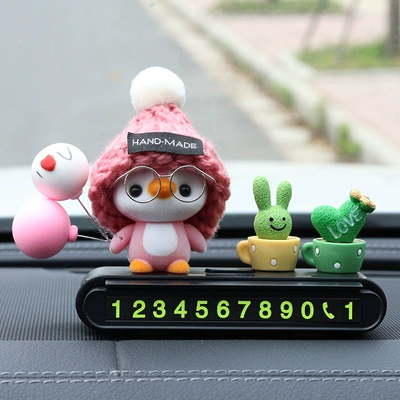 license plate, phone number removal | Nömrəli dayanma kartı - pink-hatted-penguin-black-parking-sign-green-plant