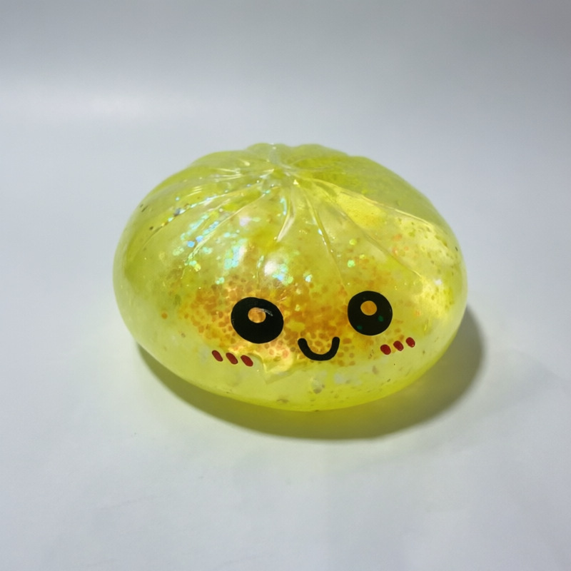 Cartoon sonriente gran bolón de bolón desempaquetado polvo de oro de malta bolón de vapor juguetes pellizco juguetes divertidos juguetes para niños