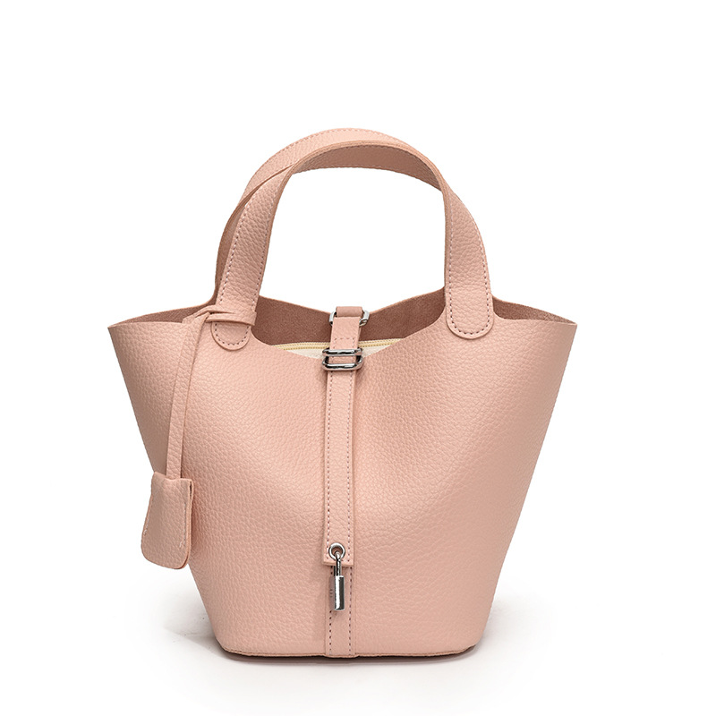 Bolsos de cesta de verduras de estilo caliente de comercio exterior para mujer 2025 nuevo bolso de cubo de ocio simple bolso femenino de alta gama de nicho