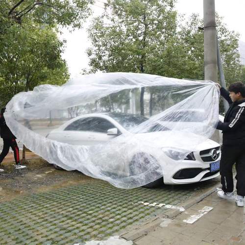 Disposable car clothing, sun protection, water and rainproof plastic transparent car cover, car dust cover, universal simple spray paint protective cover