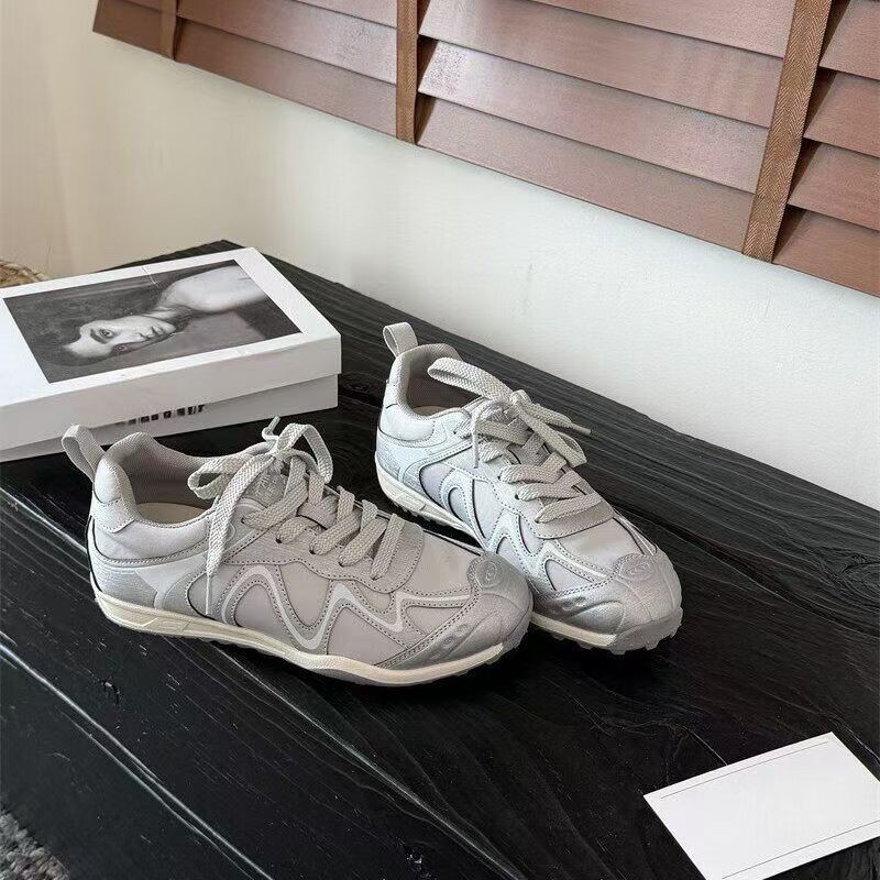 Retro casual versátil plano zapatos de entrenamiento de mujeres 2026 nuevo primavera-verano vestido baja zapatillas deportivas de estudiantes