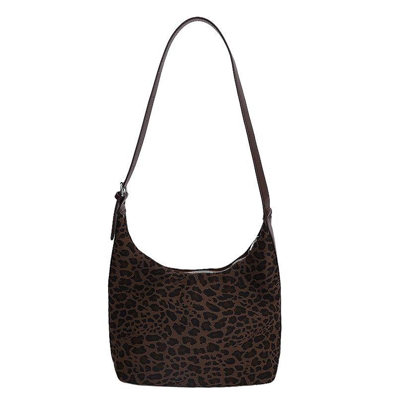 Cross-border 2025 otoño nuevo nicho de diseño brazalete texturas avanzadas retro leopardo viaje mochila de hombro