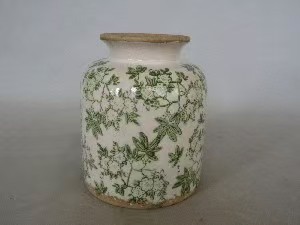 흰색 바탕에 녹색 동백꽃