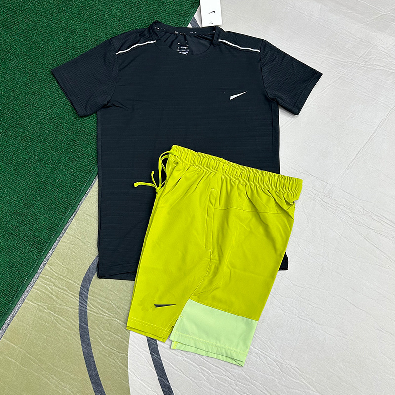 Mayorista nuevo juego de comercio exterior deportivo fitness juego de carrera rápida secado transpirable suelto ocio pantalones cortos de manga corta ropa de hombre