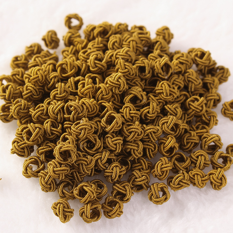 Venta al por mayor piña hebilla DIY material hecho a mano piña nudo chino nudo accesorios 6mm nylon piña nudo bolsa hebilla