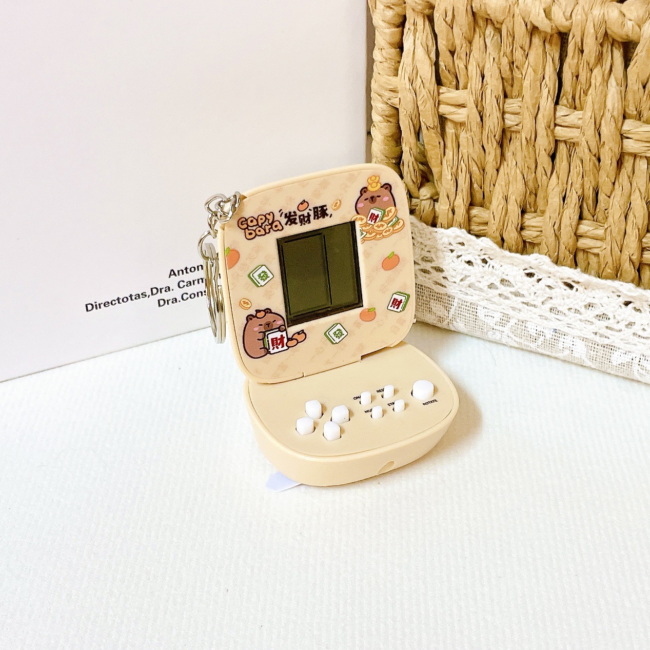 Juegos portátiles creativos de descompresión delfines de agua cámara de proyección llavero tapa de flip bolso de computadora de juegos de computadora colgante