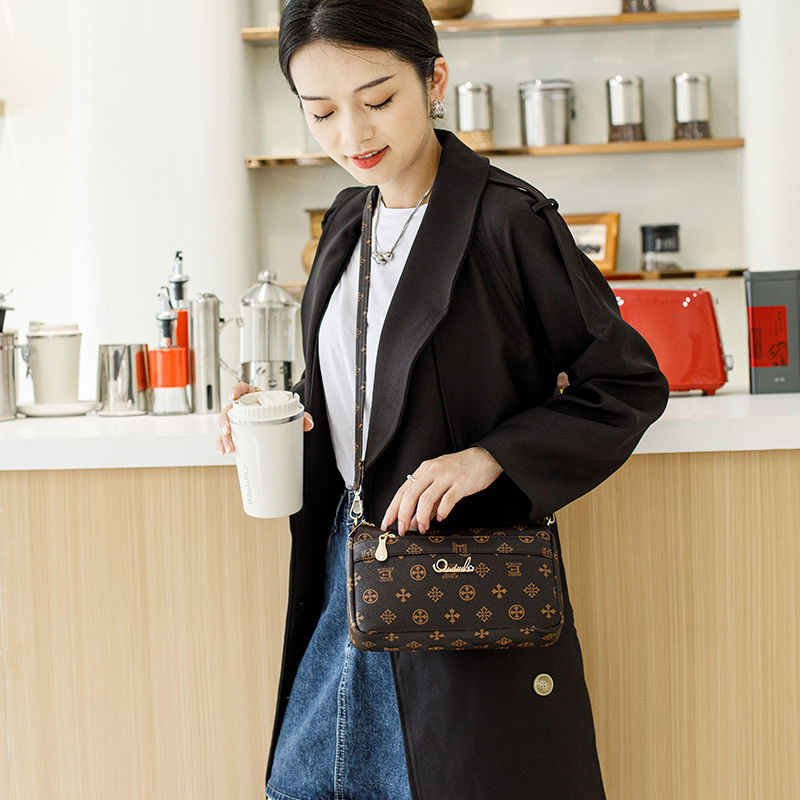 Guangzhou Hengli 2024 nuevo bolso de mensajero transfronterizo bolso casual de mediana edad bolso de teléfono móvil para mujer bolso de venta caliente bolso de hombro