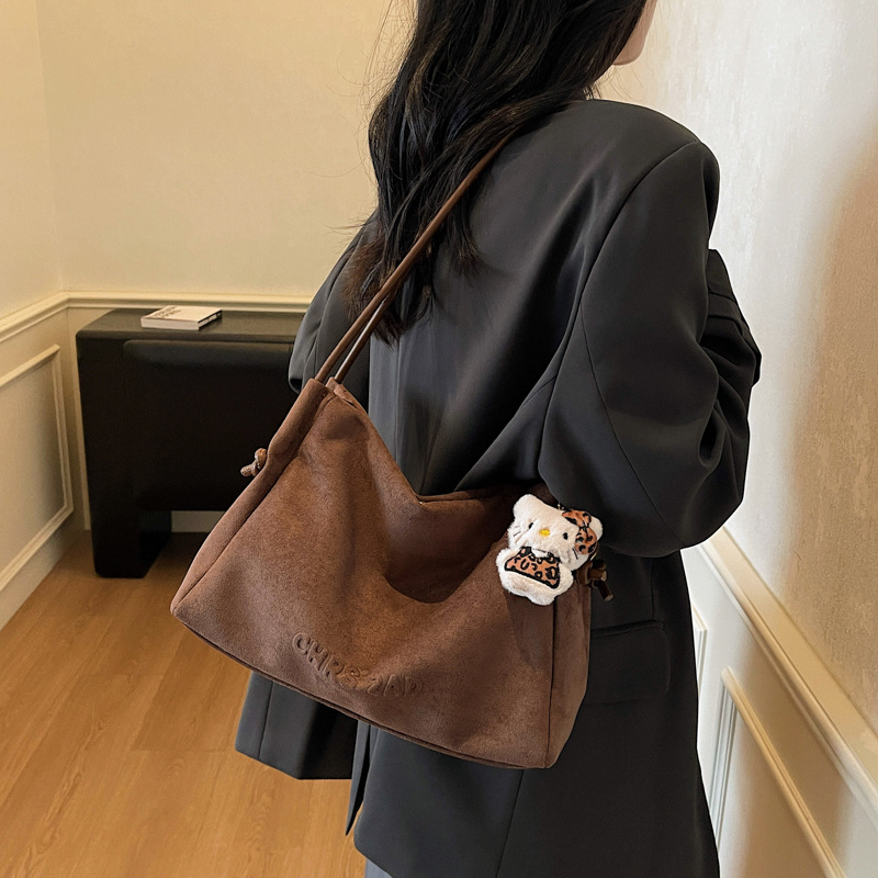 Otoño y invierno bolsas de gran capacidad para mujeres 2025 nuevo retro viaje bolsas de hombro de tern de camisa ocio bolsas de mano