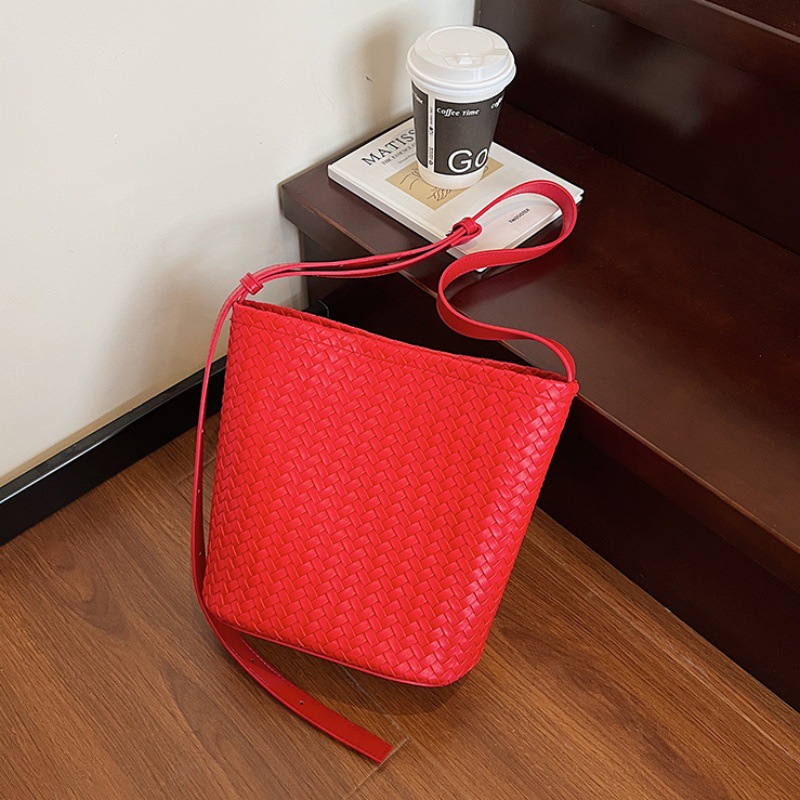 Bolso de cubo de textura transfronteriza 2025 verano nuevo bolso femenino retro tejido patrón bandolera moda niño-madre bandolera