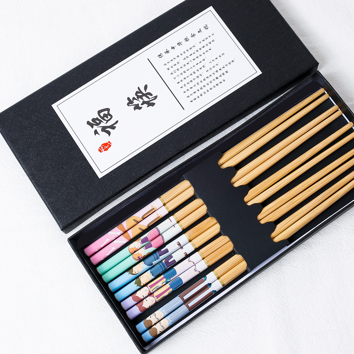 Palillos de bambú para el hogar al por mayor de dibujos animados macaron color de alto valor lindo 24cm comida dividida una persona, palillos 5 pares caja de regalo