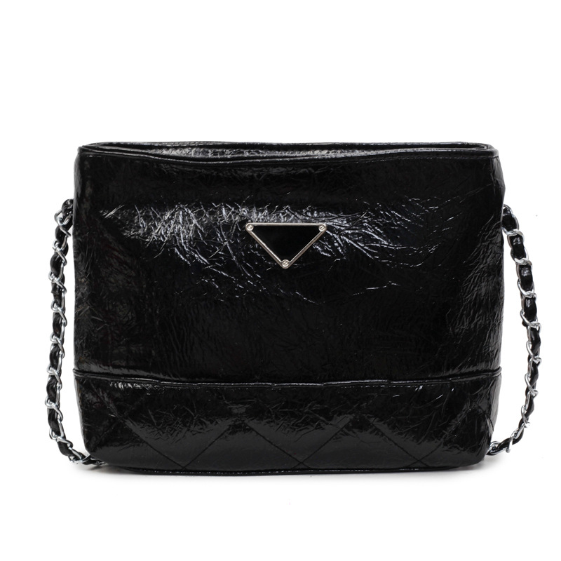 Bolsa de cadena de textura de alta calidad 2025 verano nuevo estilo bolso femenino moda patrón de agarre de mano bolso bandolera bordado con rombos