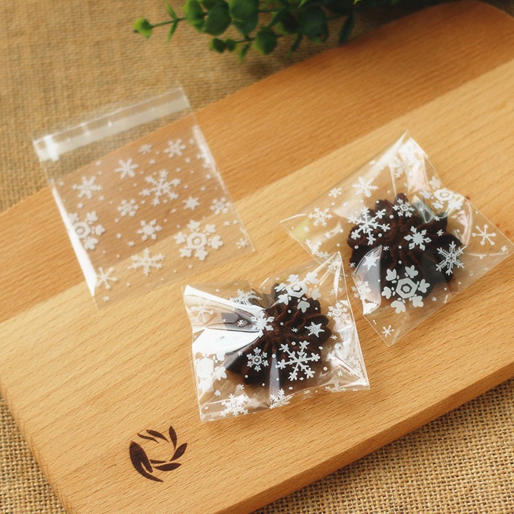 现货白色圣诞小雪花饼干烘培糖果OPP自粘自封手工食品茶叶包装袋