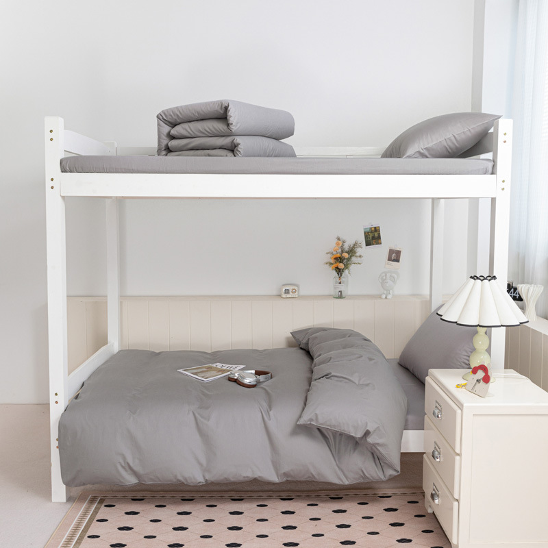 Cama de algodón de color puro para estudiantes universitarios de tres piezas dormitorio de algodón puro sábana individual funda de edredón ropa de cama 2025 nuevo estilo