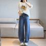 牛仔弯刀裤