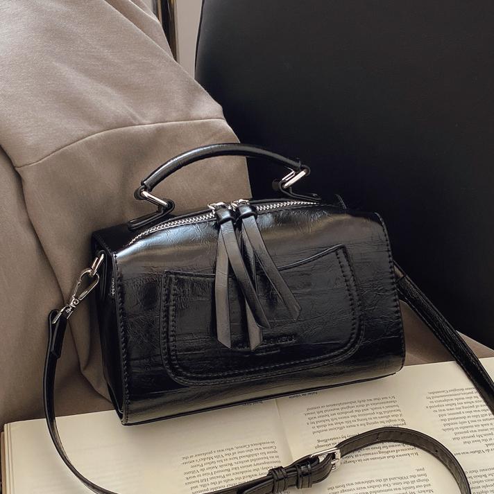 Bolso de mano de tendencia retro para mujeres 2025 nuevo diseño versátil bolso de almohada transfronterizo simple alta sensación mochila