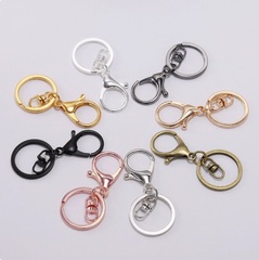 現物卸売りDIY合金のキーホルダーの三つのセットの金色のカバンのぬいぐるみのペンダントのキーホルダーの部品