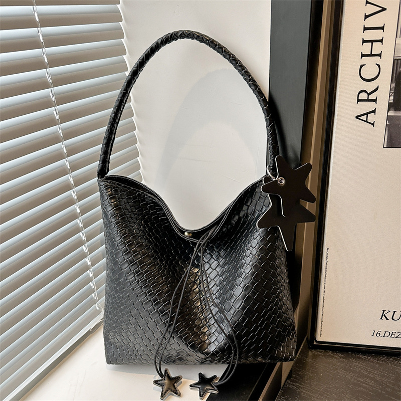 2025 bolso tejido súper caliente para mujer nuevo bolso de axila de un solo hombro de alta gama para mujer bolso de viaje de gran capacidad