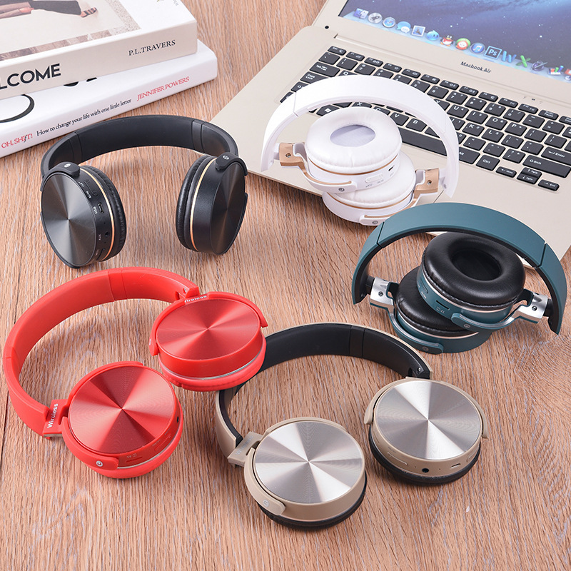 Procesamiento de auriculares personalizados 950, película láser de metal, tarjeta enchufable FM, auriculares Bluetooth inalámbricos de alta calidad
