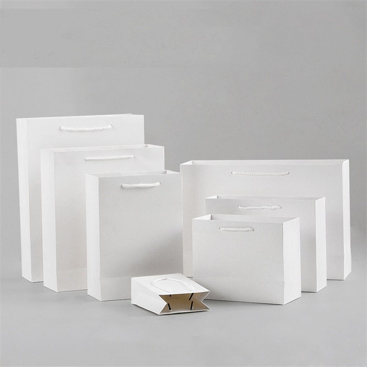 服装购物通用包装手提牛皮纸袋现货手提袋覆膜白卡礼品袋礼盒