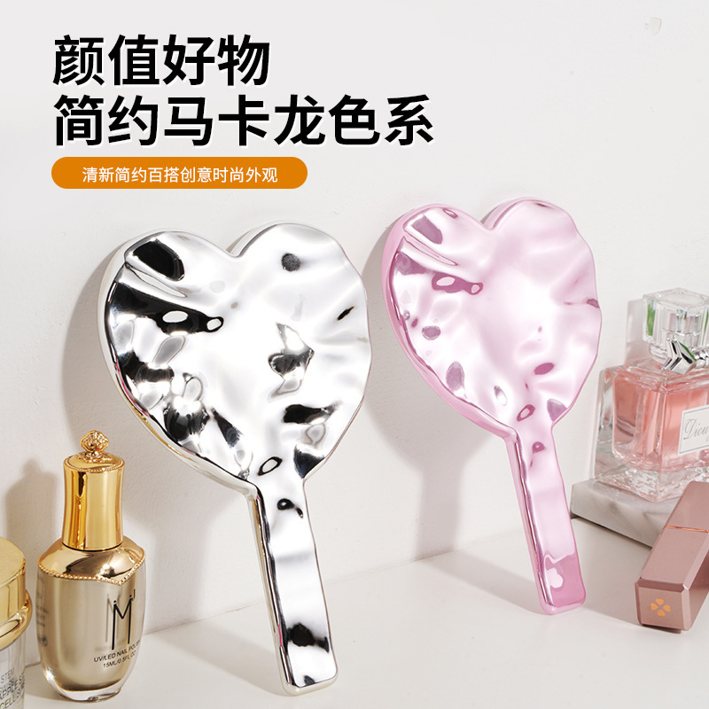 国境を越えたアマゾン愛メッキ鏡携帯少女は洗練されたかわいい高解像度鏡面化粧鏡を持っている|undefined