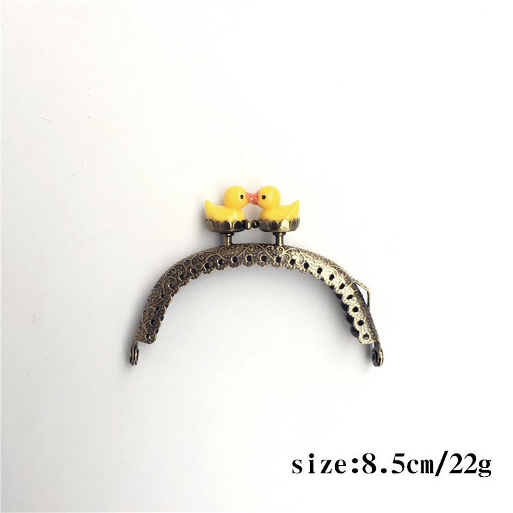 20% de descuento: 8.5CM arco de encaje en relieve pato amarillo oro cabeza de pato animal