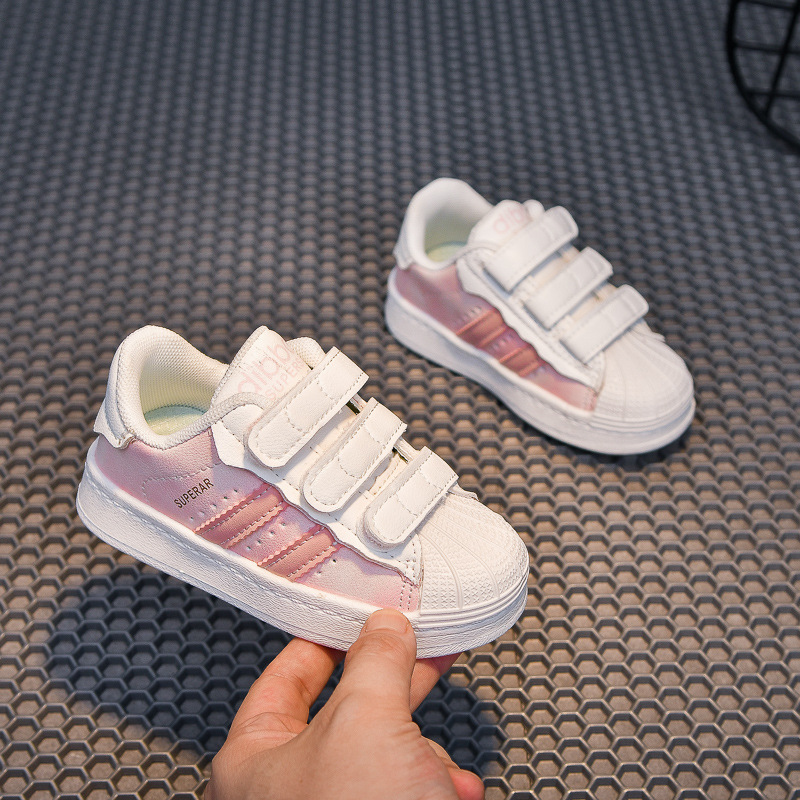 2025 primavera y otoño nuevo estilo para niños cabeza de concha zapatos casuales niñas cuatro estaciones zapatos blancos zapatos deportivos con velcro para niños