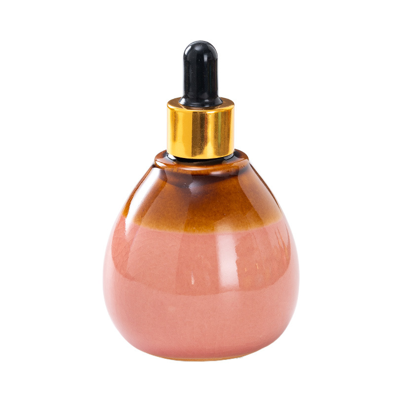 Cuentagotas de vidrio de alta calidad Esencia de aceite esencial de cerámica Cuidado de la piel botella salón de belleza spa tailandés aromaterapia spa botella de despliegue