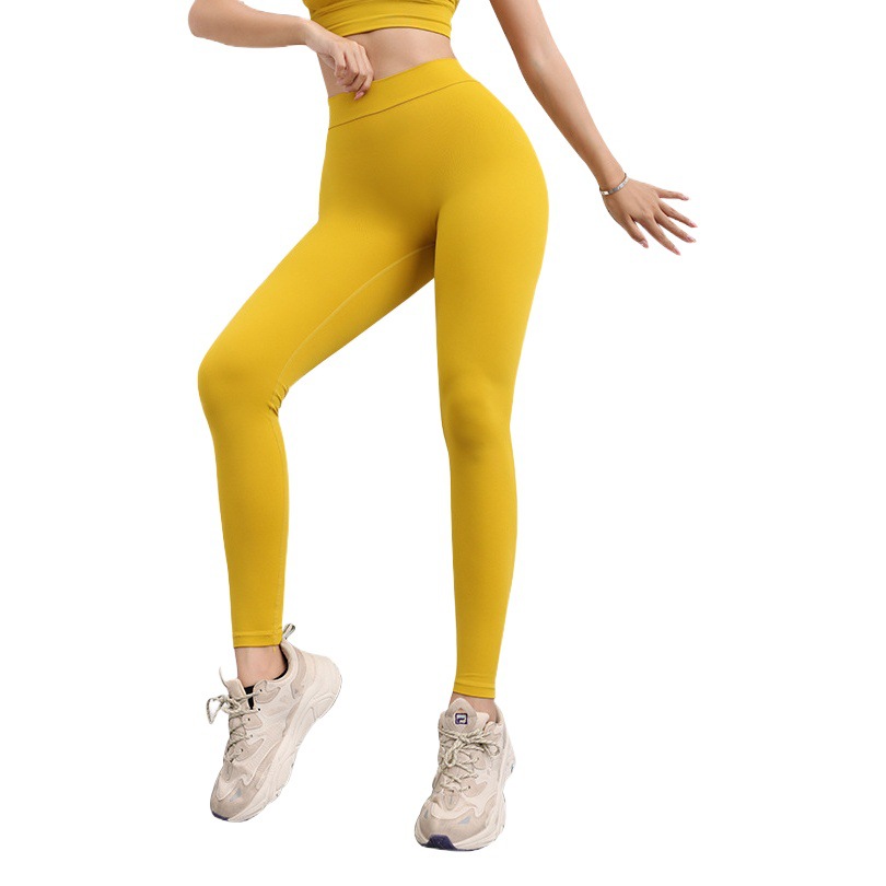 Pantalones de yoga para mujer estilo europeo y americano, con efecto realce de glúteos en forma de V, de cintura alta, con tacto suave y efecto nude, ideales para fitness y deporte.