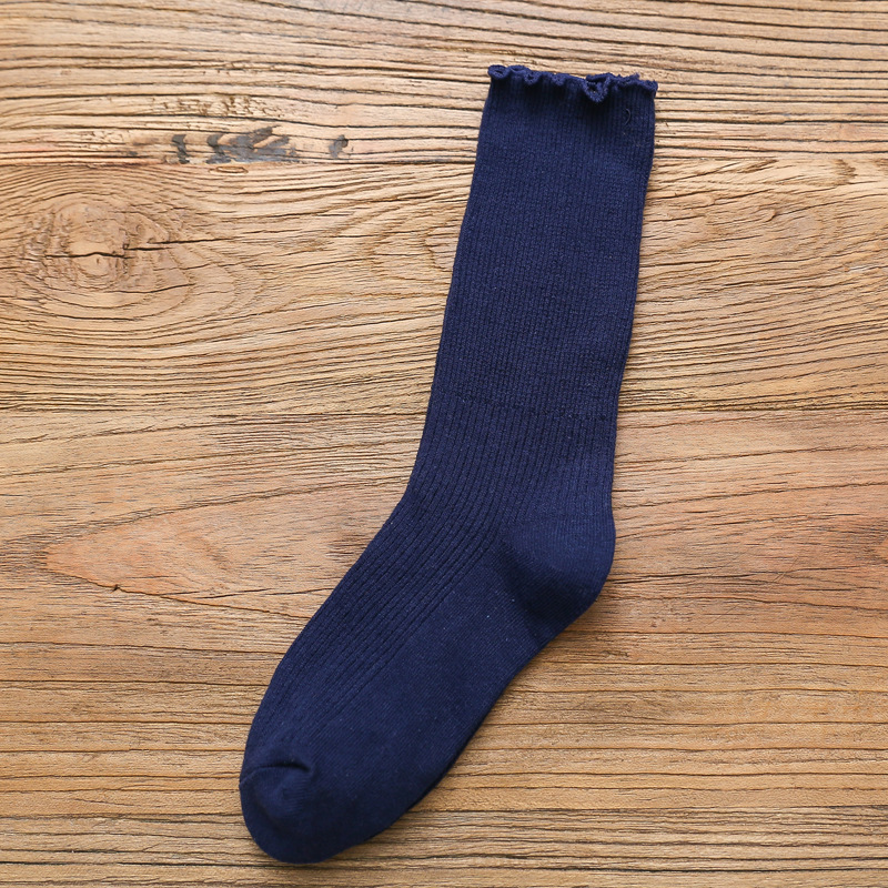 Primavera y otoño de las mujeres delgadas de algodón oreja de madera doble aguja pila calcetines japoneses retro color sólido ins largos calcetines casuales al por mayor