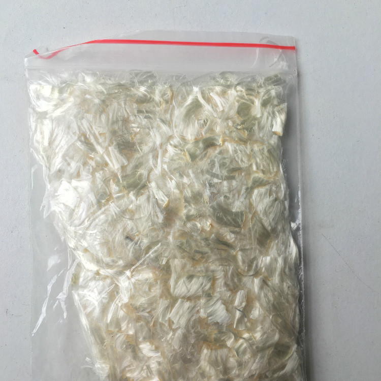 抗滑表层吸附木质素纤维 市政高速用加筋稳定絮状颗粒状邮寄纤维