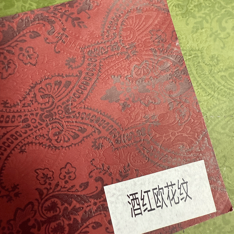 120g de papel especial en relieve papel de arte de red de red de impresión de papel en relieve de color papel de embalaje de libro rojo pequeño