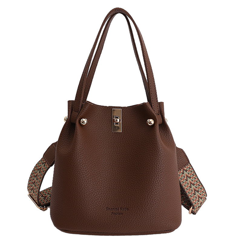 Bolso de cubo de mano de gran capacidad de mujeres venta caliente transfronteriza nuevo lichi bloqueo plegable moda casual bolso de mochila