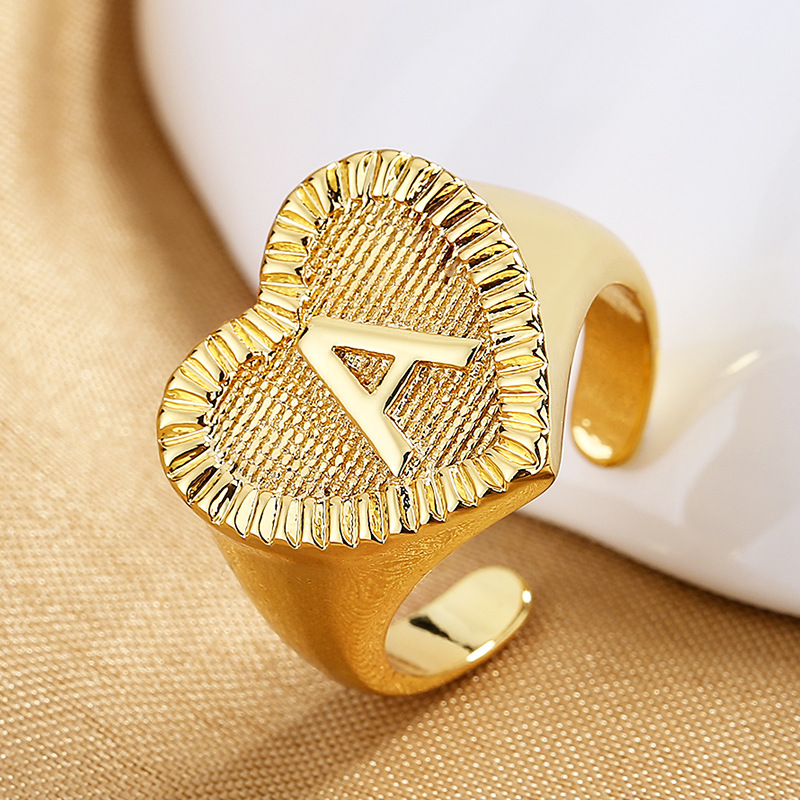 fashionable golden retro ring