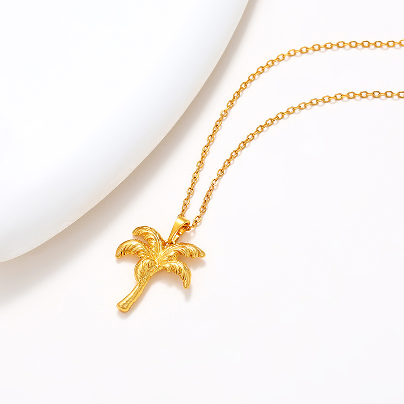 Xuping aleación de cobre dorado colgante de árbol de coco otoño y invierno personalidad de alto nivel nicho ligero colgante joyería de lujo mujer
