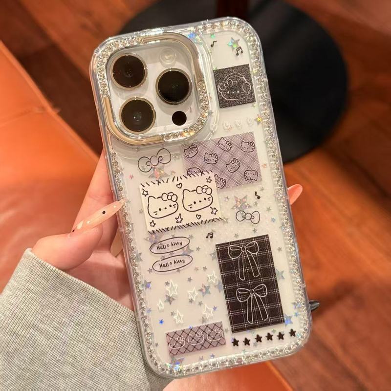 漫画かわいい KT 猫リボンコラージュラベル Apple 16promax 携帯電話ケース iphone15 ダイヤモンドがちりばめられています|undefined