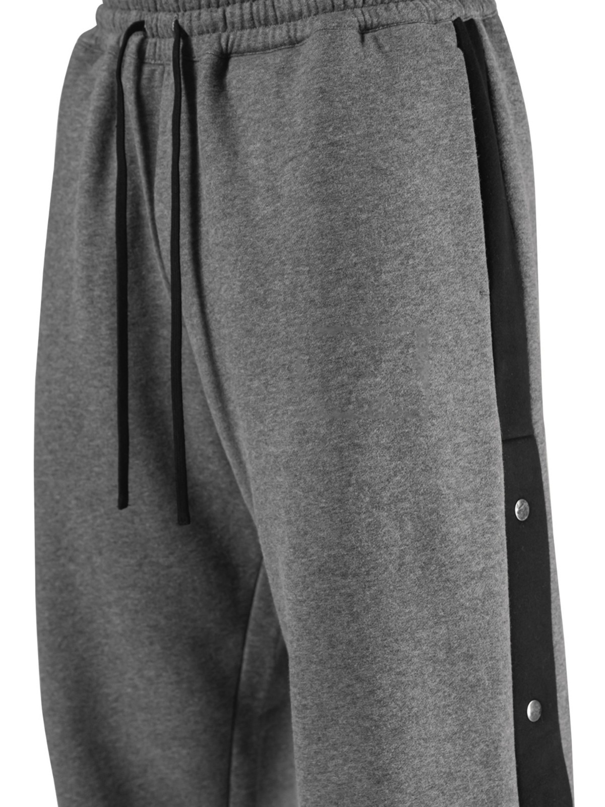 Los deportes de otoño e invierno de los músculos locos están completamente abiertos con hebillas y pantalones de terciopelo. los hombres están relajados y relajados. los pies están atados en otoño e invierno y los pantalones deportivos de terciopelo.