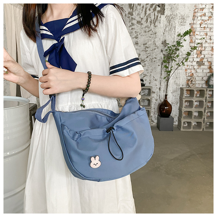 The new 2022 Little Bear canvas small bag for women is simple and versatile. The student dumpling bag is a trendy casual single-shoulder crossbody bag undefined
