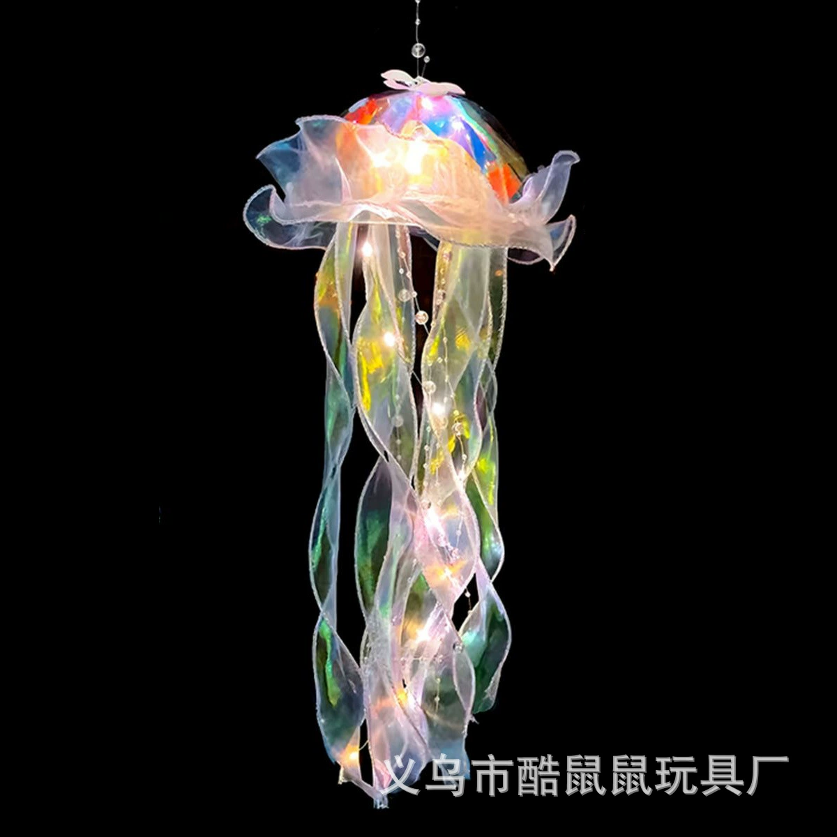 Светящаяся лампа-цикада-небесная медуза? Я не уверен. User had "Luminous Jellyfish Lamp, Crystal Handheld Night Light, Iridescent LED Decorative Toy". Translation: "Светящаяся лампа-аквариум?" Wait jellyfish lamp is jellyfish lamp. In Russian: "Сияющая лампа-джеллифиш" proper: "Сияющая лампа-js медуза". Better: "Сияющая лампа-медуза". Crystal handheld night light: «Кристальная портативная ночная подсветка» Iridescent LED decorative toy: «Иридесцентная светодиодная декоративная игрушка»